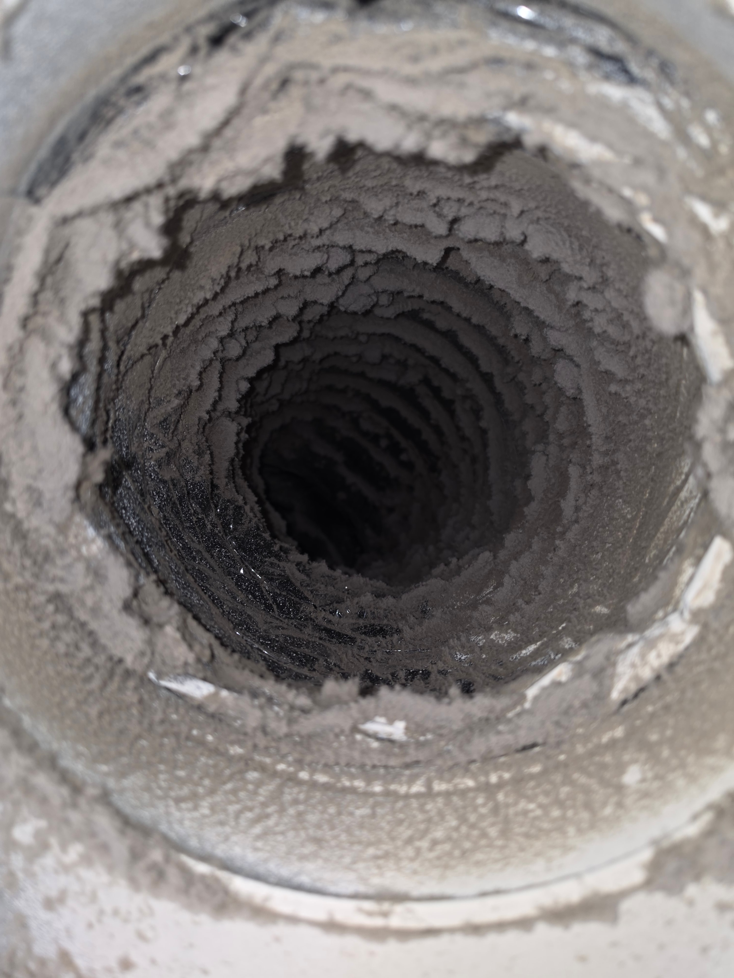 Duct interior packed with heavy mold and debris buildup — Lakewood NJ home before cleaning
