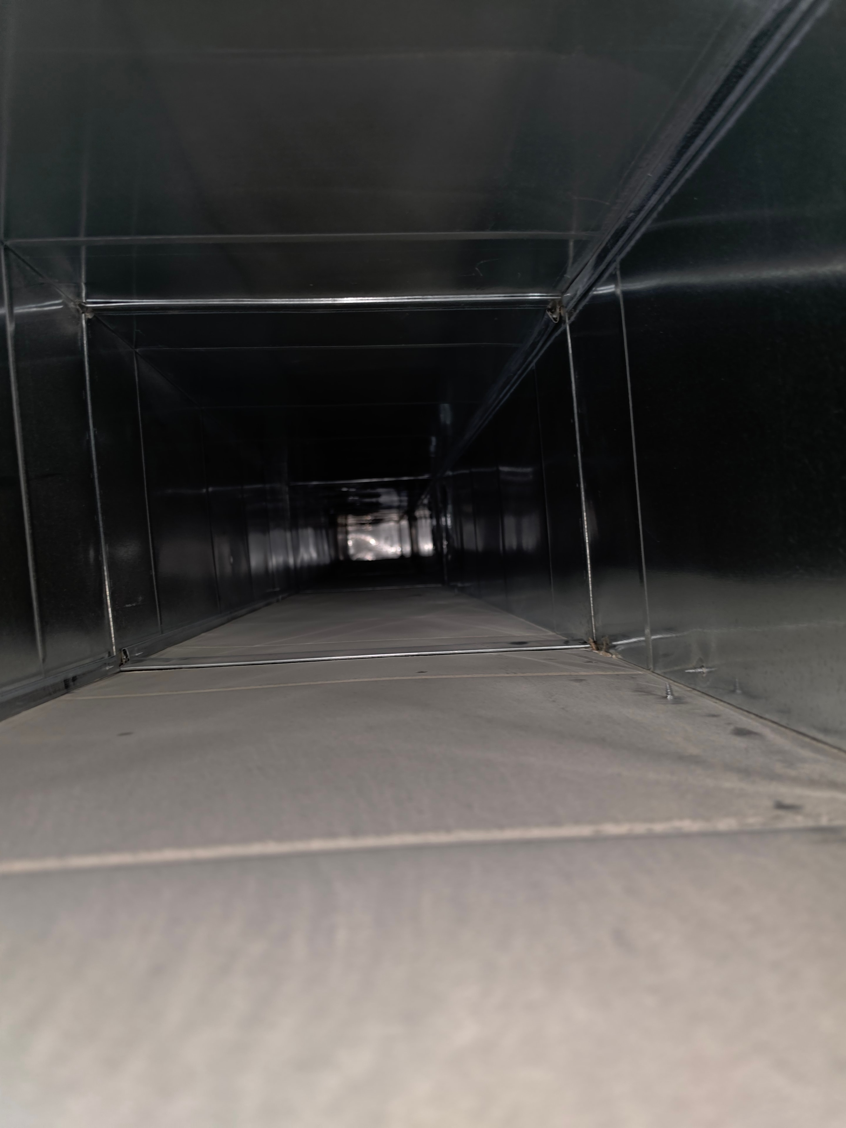 Main trunk duct interior coated in construction dust — Lawrence Township NJ before cleaning