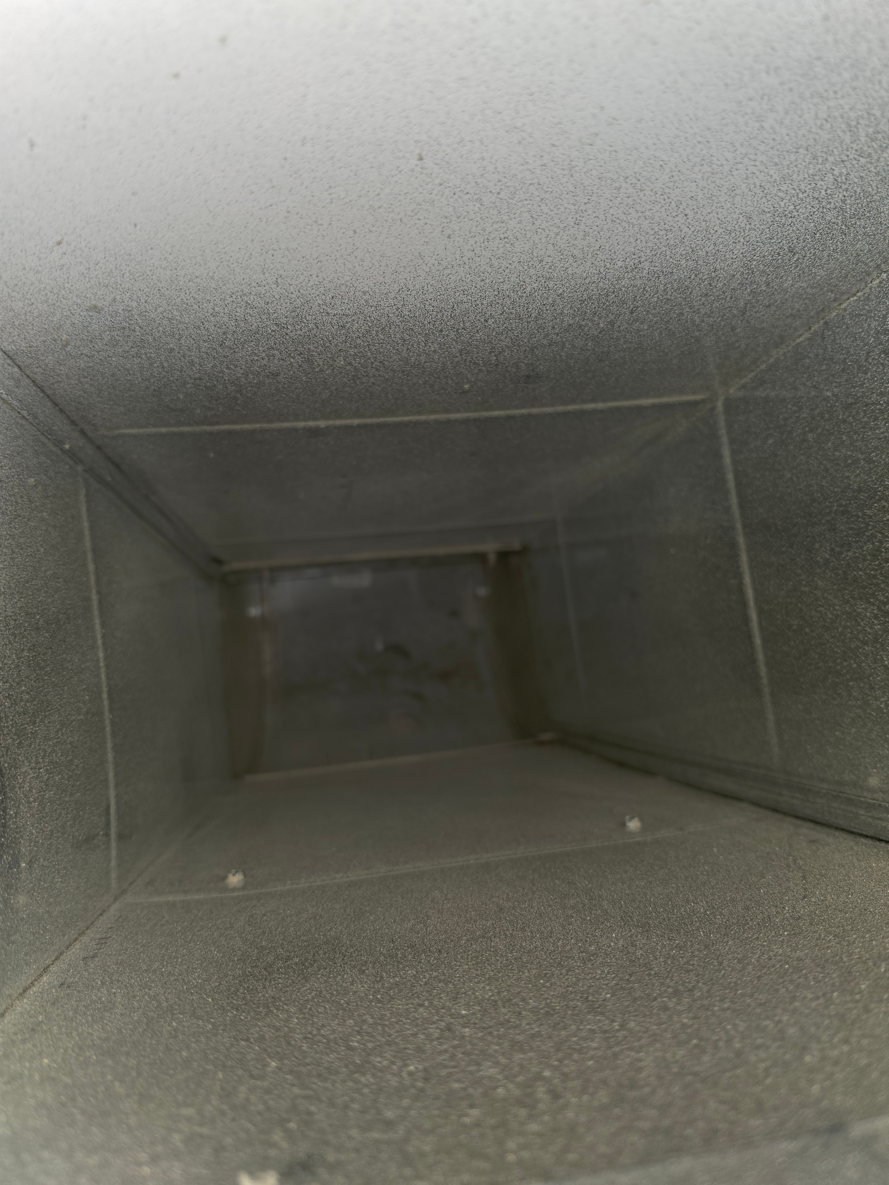 Supply duct box coated in drywall dust and debris — Lawrence Township NJ new construction before cleaning