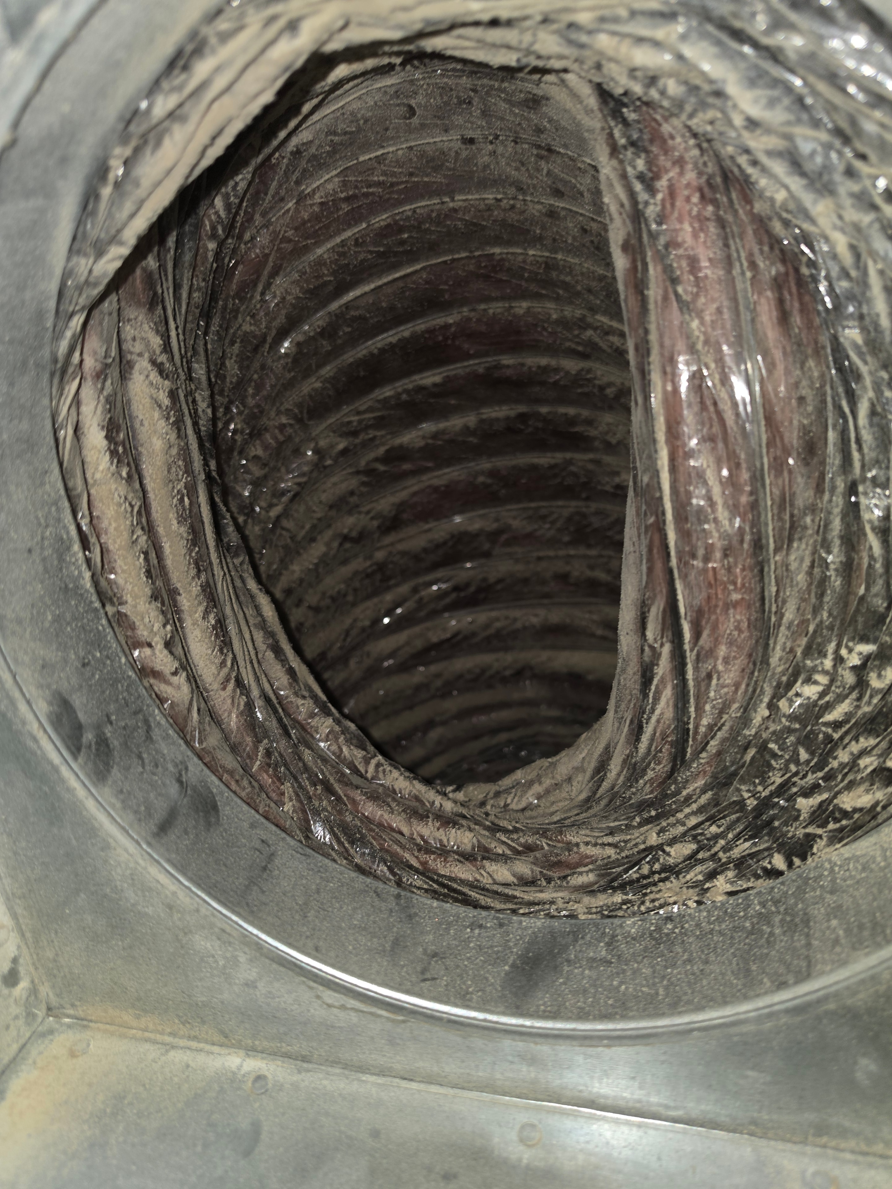 Duct trunk heavily coated in debris and allergens — Summit NJ before cleaning